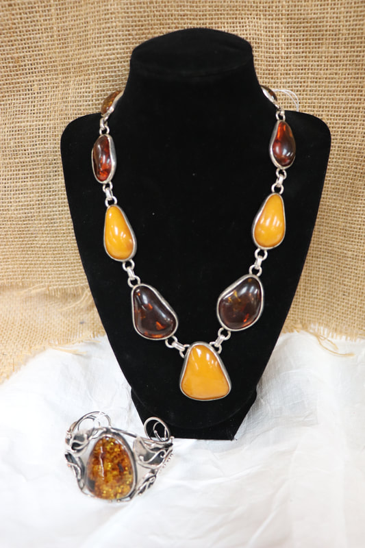 Baltic amber w/ sterling silver vintage necklace: $290 /Amber & sterling silver hand made vintage cuff: $220